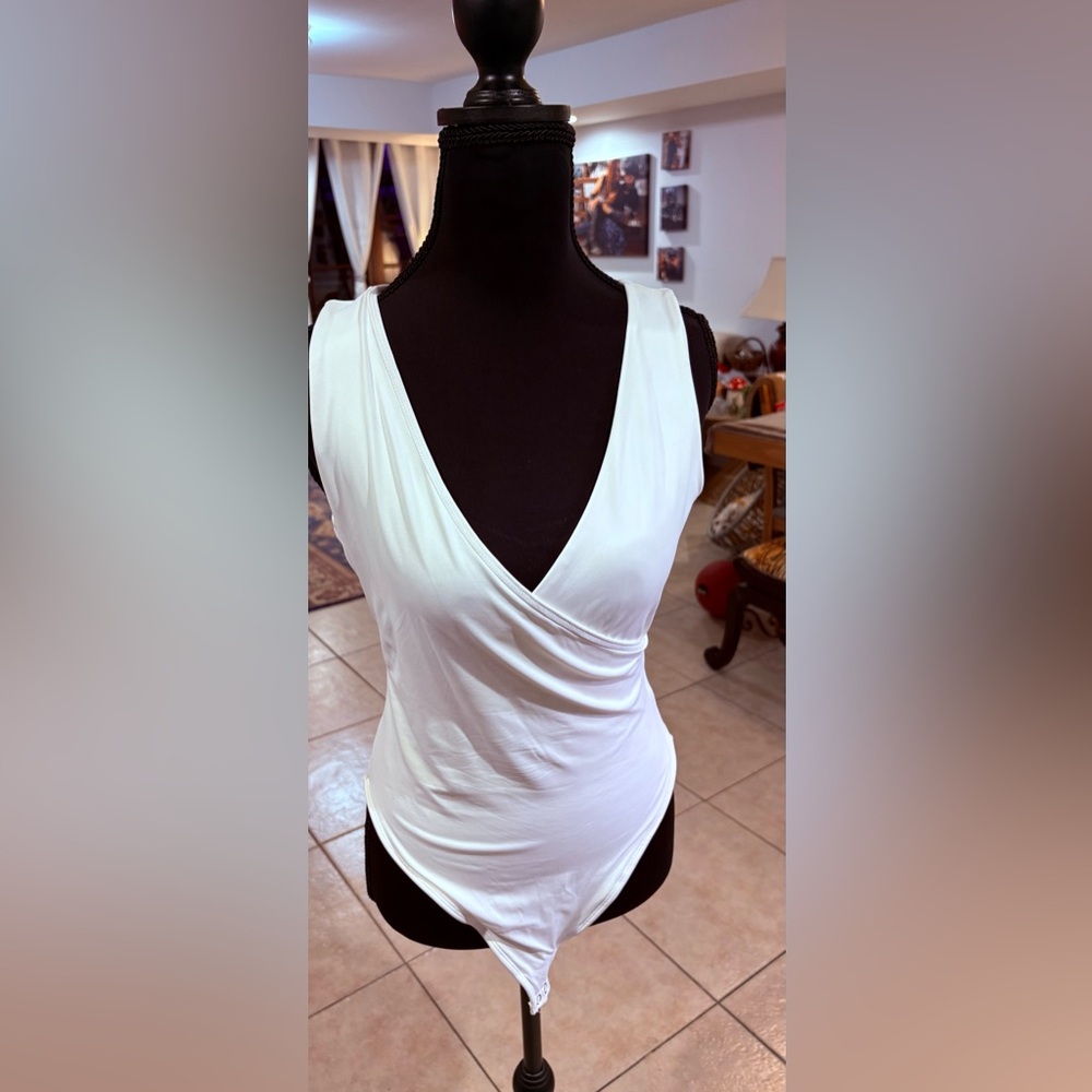 And Now This White Bodysuit